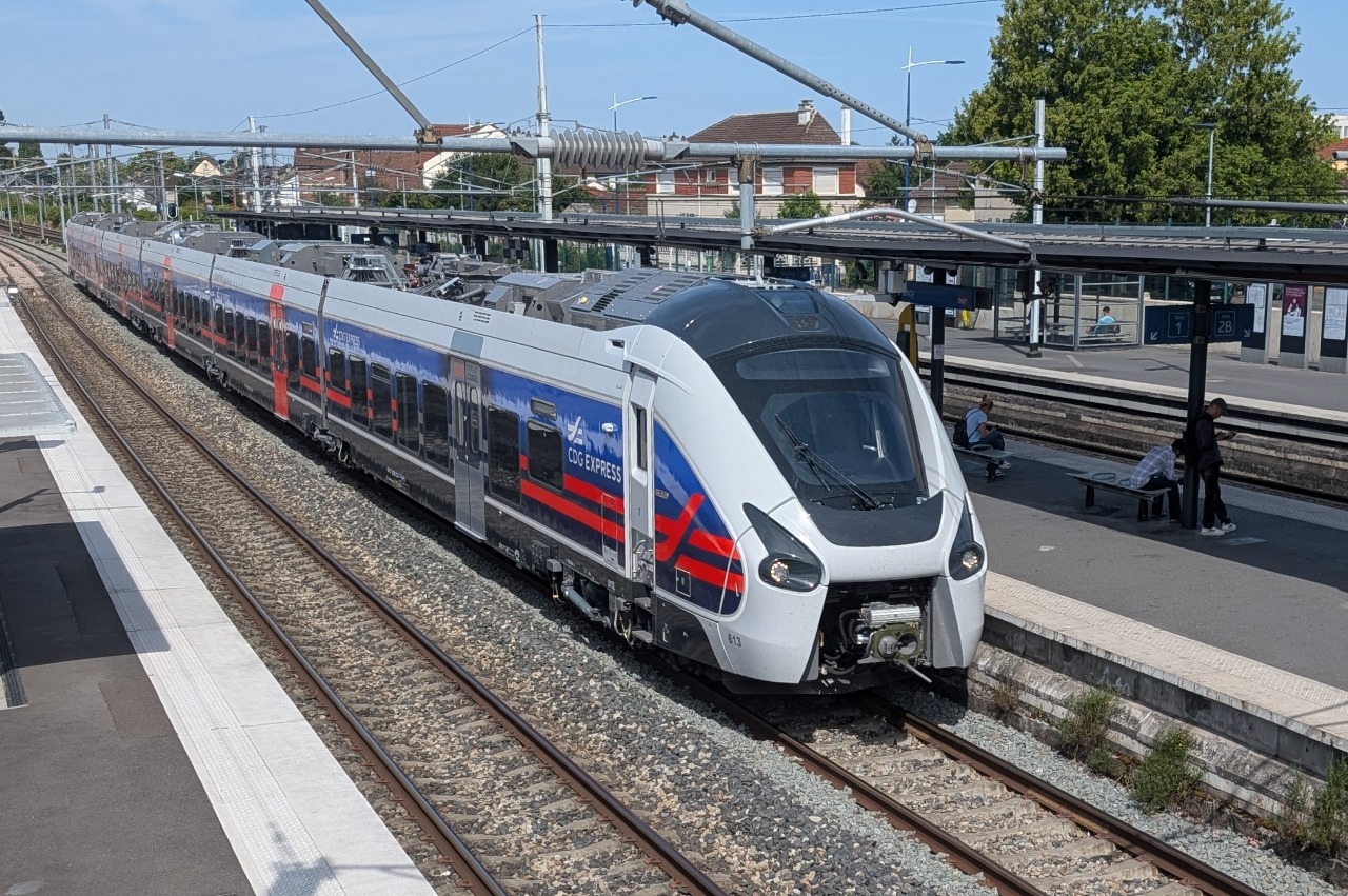 Alstom Coradia Liner trainset #613 with CDG Express livery at Drancy station during trials.