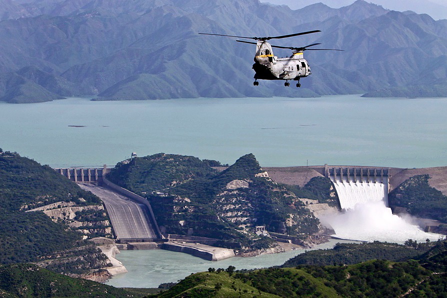 A U.S. Marine Corps CH-46 Sea Knight helicopter flies near the Tarbela Dam in Pakistan's Khyber-Pakhtunkhwa province, Aug. 27, 2010. Defense Department officials announced Aug. 30, 2010, the deployment of 18 helicopters to Pakistan from the 16th Combat Aviation Brigade, based at Fort Wainwright, Alaska.