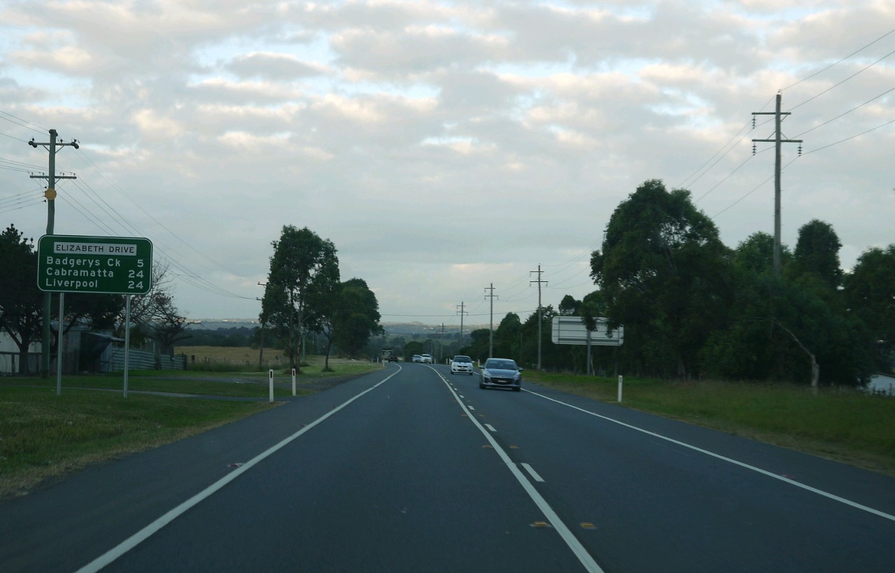 Road sign on Elizabeth Drive at Luddenham looking east