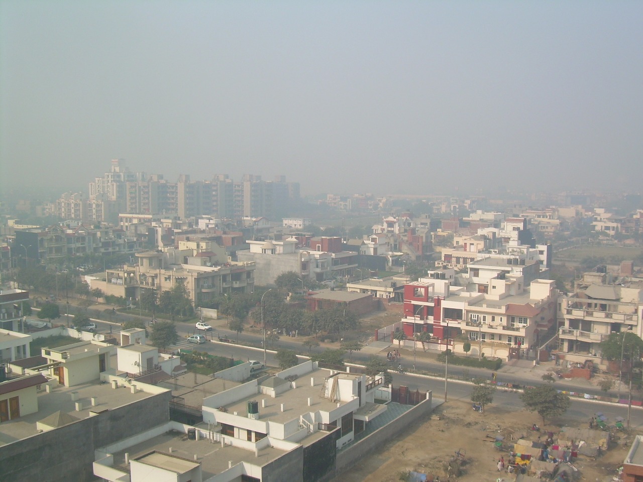 The sprawling but increasing density of the south-east suburb of Noida. Noida is growing rapidly as people either leave Delhi proper for more space or simply add to the population of one of the world's biggest cities. And that will likely only accelerate once the Delhi Metro line link gets completed next year. It is amazing the contrast from the shots of Old Delhi just before.
