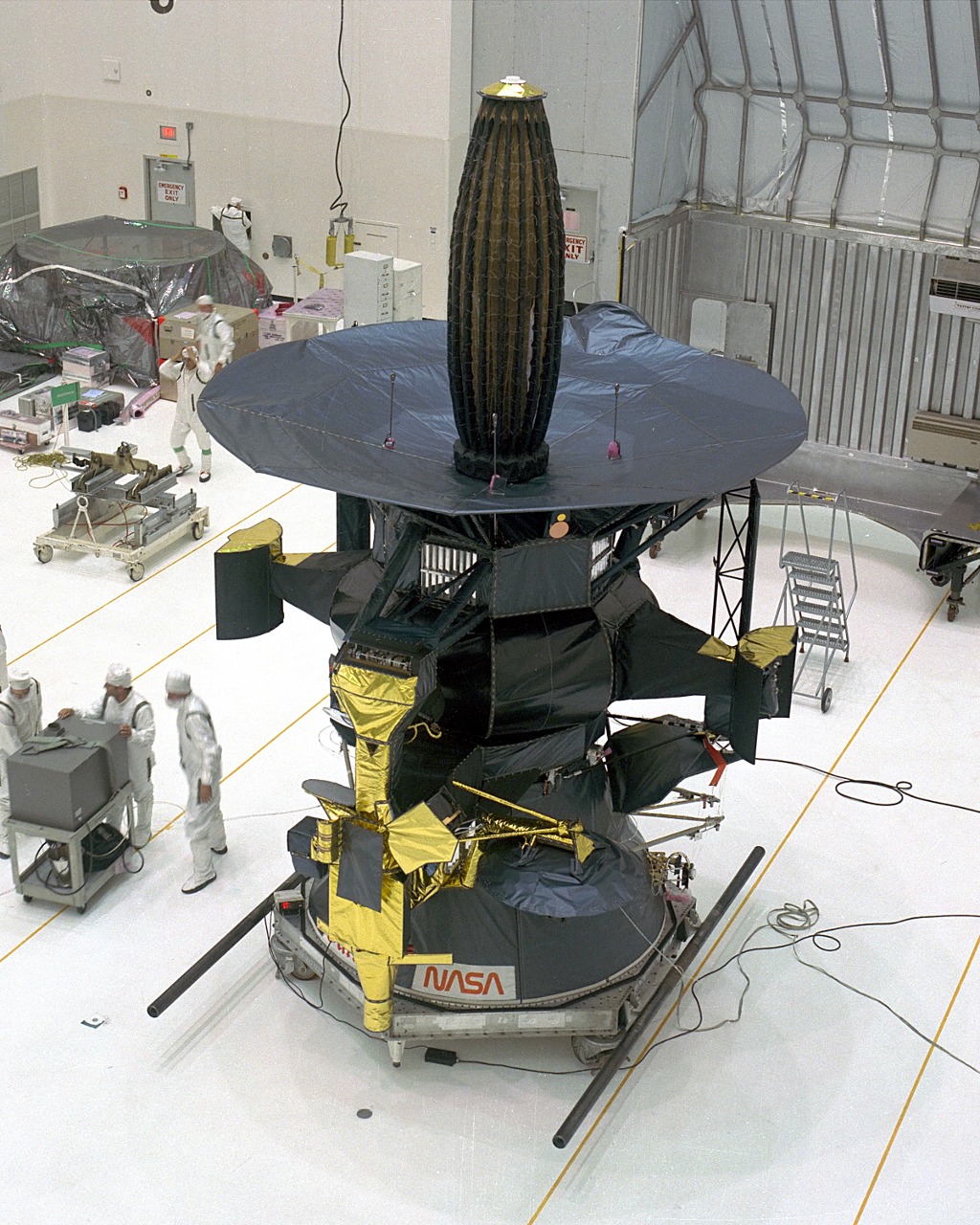 In the Vertical Processing Facility (VPF), the spacecraft Galileo is prepared for mating with the Inertial Upper Stage booster. Galileo will be launched aboard the Orbiter Atlantis on Space Shuttle mission STS-34, October 12, 1989 and sent to the planet Jupiter, a journey which will take more than six years to complete.