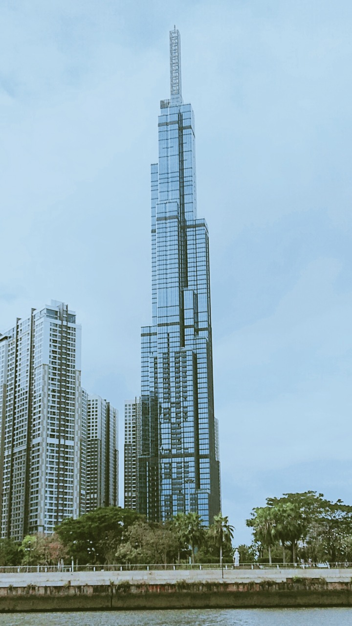 This image is about Landmark 81 view on the Saigon River.
