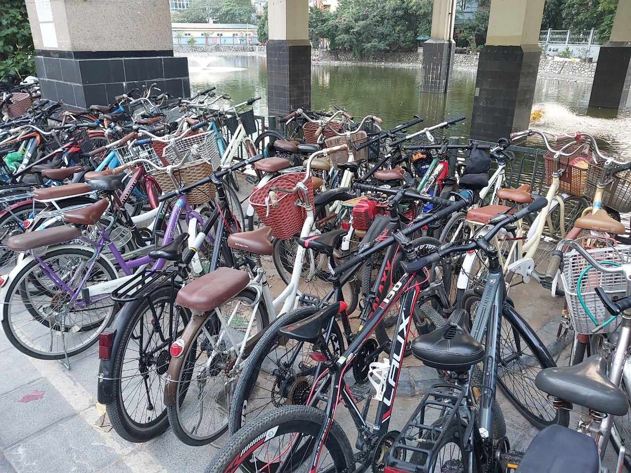 Bicycle parking next to the Cat Linh metro Station in Hanoi, Vietnam. November 2024.