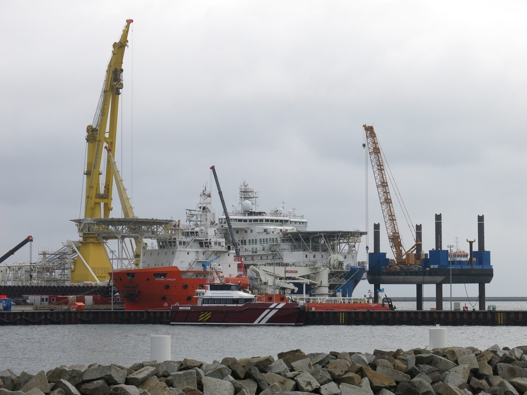 Two ships involved in construction of the natural gas pipeline North Stream 2: offshore support vessel ARTEMIS OFFSHORE and in background pipe layer AKADEMIK CHERSKIY, Mukran, September 2020