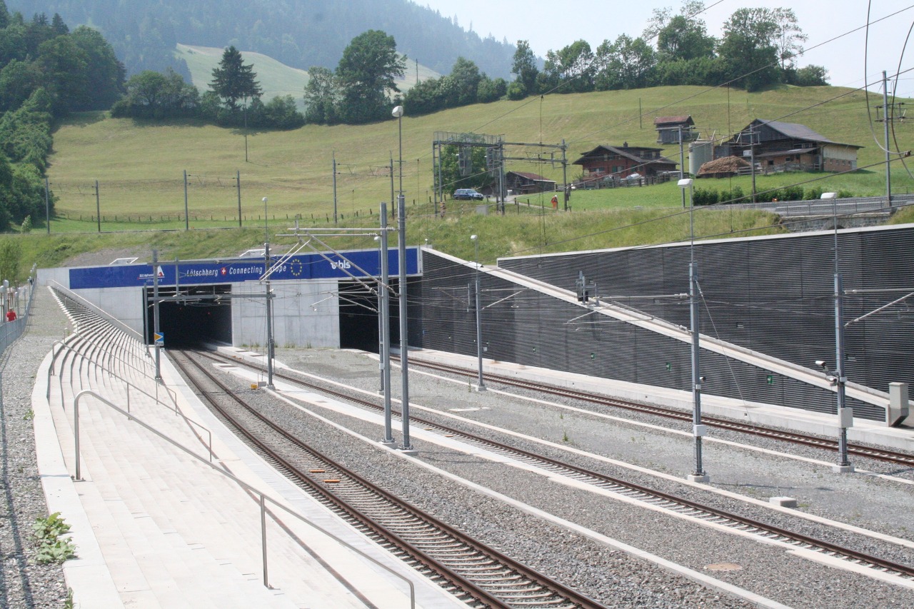 North portal of the Lötschberg base tunnel near Frutigen, Canton of Bern, Switzerland. Right before the tunnel entrance is the so called intervention site. The idea is that trains which are on fire must not stop inside the tunnel but leave the tube if possible and evacuate people here. That's what the stairs are intended for. Firefighter access is provided from the other side.