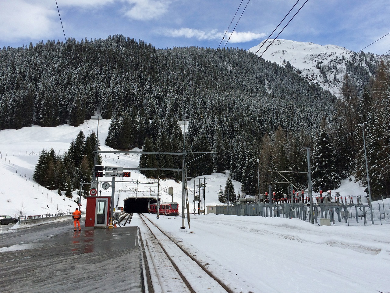 A train is leaving Vereina Tunnel in Selfranga, Klosters, Switzerland