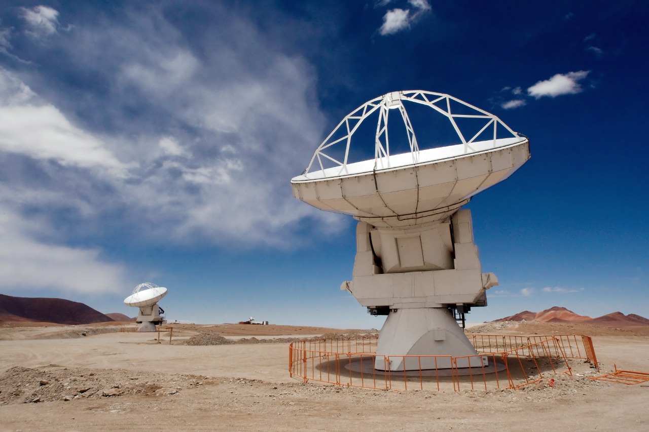 Two of the Atacama Large Millimeter/submillimeter Array (ALMA) 12-metre antennas gaze at the sky at the observatory’s Array Operations Site (AOS), high on the Chajnantor plateau at an altitude of 5000 metres in the Chilean Andes. Eight antennas have been installed at the AOS since November 2009. More antennas will be installed on the Chajnantor plateau during the next months and beyond, allowing astronomers to start producing early scientific results with the ALMA system around late 2011. After 