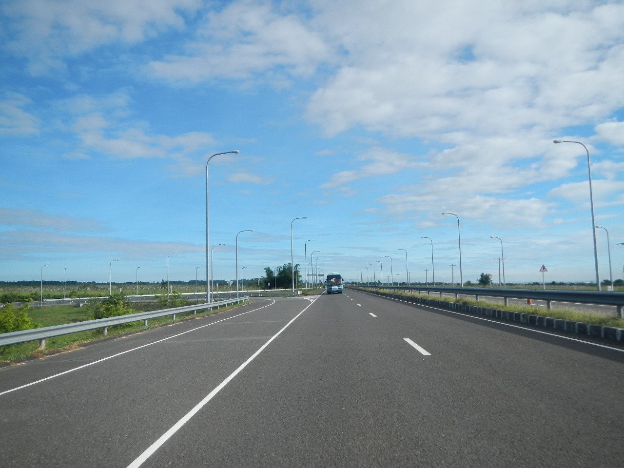Upload Wizard photos of - - Pan-Philippine Highway[1] or Daang Maharlika - along the scenic and most beautiful Subic–Clark–Tarlac Expressway SCTEX [2] taken from a UV Van Express going to Balanga, Bataan, moving vehicle photography of the amazing scenery of hills and mountains, Sierra Madre Mountain ranges, Central Luzon to Dinalupihan exit at Dinalupihan, Bataan [3] exit going to Layac, Dinalupihan, Bataan.