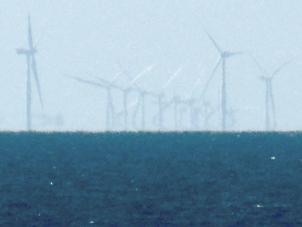 The Duddon Sands West Offshore Wind Farm. I suppose these wind dynamos are going to be part of the normal seascape from now on. Uploader's note: Photo was apparently taken from the seafront at Blackpool.